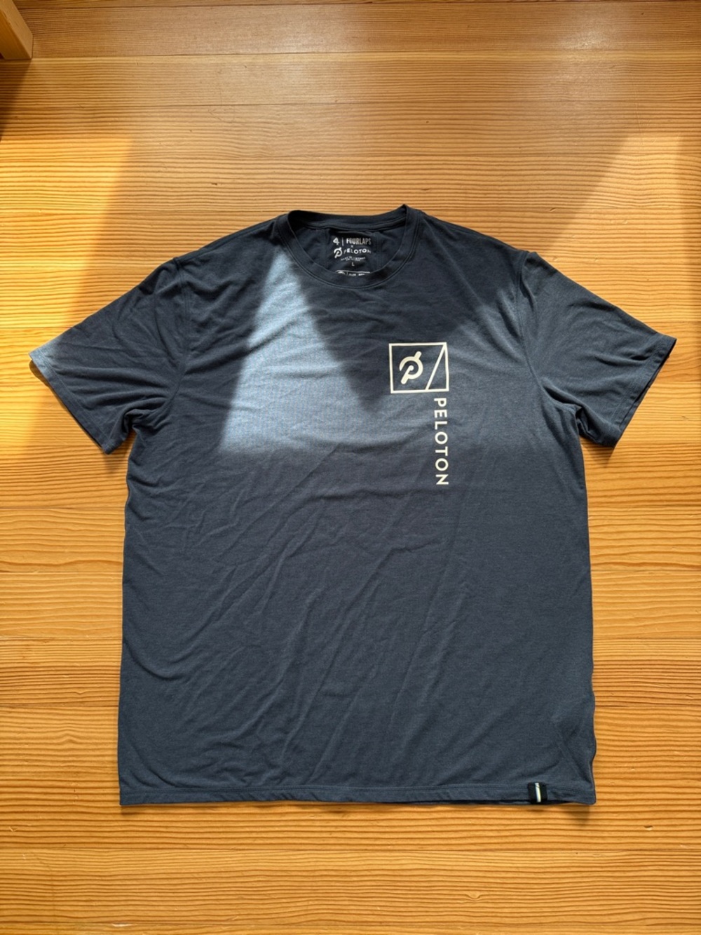 Peloton Dark Navy Blue Tee with Vertical Logo FOURLAPS size L